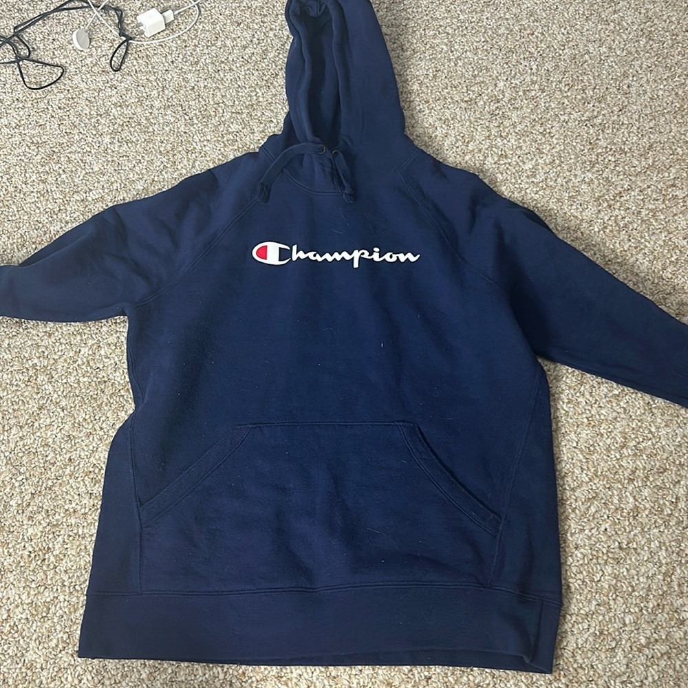 Navy blue high neck champion hoodie.
